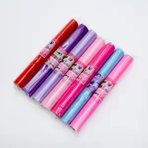 Multi-color tulle fabric rolls for wedding decoration, floral packaging, and party venue setup.