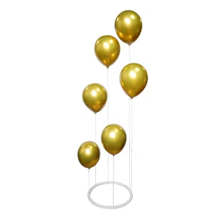 Balloon stand kit detail, gold balloons with white poles and circular base for party decor.