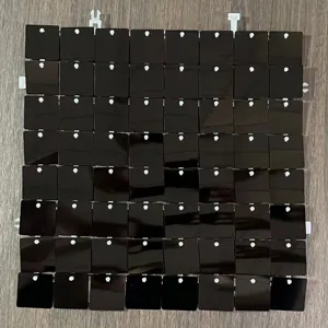 Glossy black sequin wall panel detail, square sparkle wind panel for party stage backdrop.