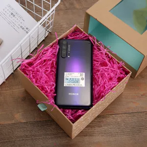 Pink shred paper raffia filler for gift box, premium chocolate packaging material.
