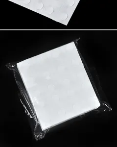 Detail shot of clear balloon glue points double sided adhesive dots for party decoration setup.