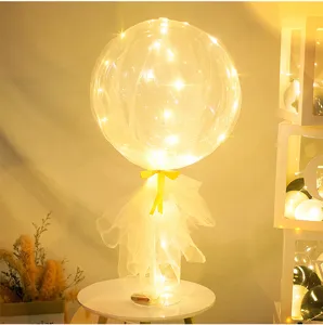LED Bobo balloon table centerpiece with fairy lights and tulle for party wedding decor.