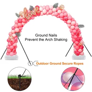 Detailed view of balloon arch ground nails and secure ropes for outdoor party setup.