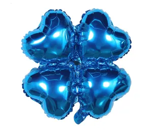 Blue four-leaf clover aluminum foil balloon detail shot for party and event decoration.