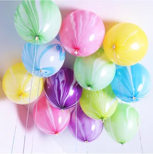 Closeup detail of colorful marble agate balloons cluster, perfect for party and wedding decor.