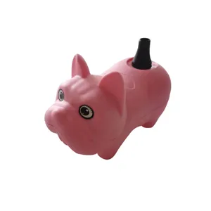 Detail view of the pink dog-shaped balloon inflation nozzle accessory for electric air pumps.