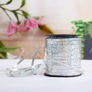 Holographic silver ribbon roll for balloon tying and wedding party decoration crafts.