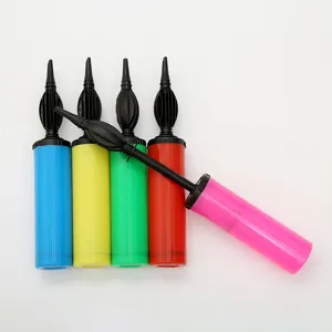 Detail view of colorful plastic manual balloon hand pumps, portable and easy to use for parties.