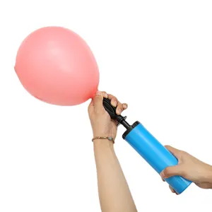 Portable plastic hand air pump for inflating balloons quickly, easy to use handheld tool.