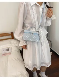 Chic stylish polka dot shoulder bag and handbag with top handle for daily casual wear.
