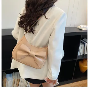Stylish Korean bow shoulder bag for women, chic beige dumpling crossbody purse for summer.