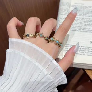 Exquisite coffee gold turquoise open ring with intricate filigree and sparkling diamond inlay for women.