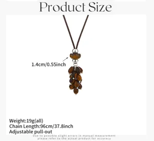 Tiger eye stone beaded necklace detail, long black cord sweater chain accessory feature.