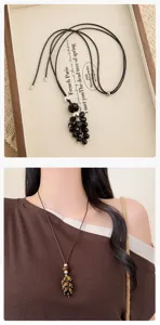 Natural stone beaded long necklace with pull string design, elegant sweater chain for women.