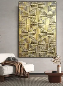 Detailed shot of modern 3D textured gold geometric wall art in a stylish living room interior.