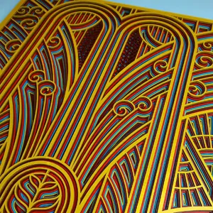 Multilayered wooden wall art, abstract mandala geometric design in vibrant colors.