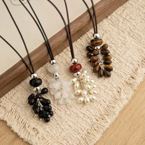 Natural stone beaded long sweater necklace for women, stylish adjustable black rope jewelry.