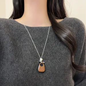 Korean style wood hollow teardrop pendant necklace with pearl and long silver chain for women