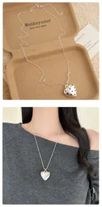 Korean ins style silver polka dot heart pendant necklace long sweater chain jewelry.