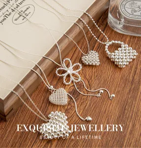 Detailed shot of Korean silver layered heart and flower pendant long sweaters necklaces.