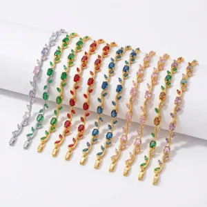 Detailed view of colorful cubic zirconia vine and branch bracelets featuring sparkling stones.