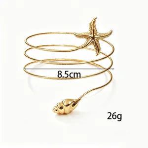 Brazalete de espiral dorada con estrella de mar y concha, joyería de playa ajustable