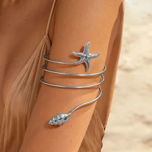 Elegante brazalete de brazo ajustable con estrella de mar y concha plateada mujer