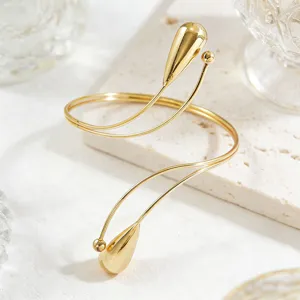 Elegante bracciale da braccio aperto in metallo dorato con gocce per donne, gioiello regolabile.