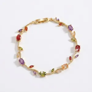 Chic gold-plated vine branch bracelet with colorful cubic zirconia stones, elegant fashion jewelry.