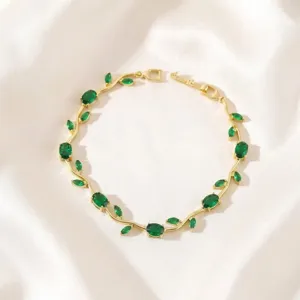 Detailed view of the gold-plated branch green zirconia bracelet showcasing exquisite leaf design.