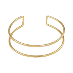 Bracciale rigido aperto in metallo doppio strato dorato gioiello moda minimalista donna.