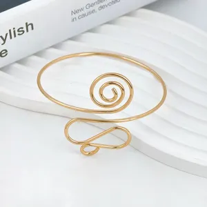 Bracciale da braccio spirale in metallo dorato design punk geometrico gioielli donna moda