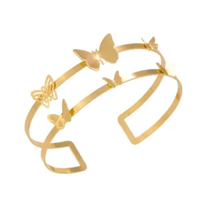 Bracciale da braccio aperto con farfalla in metallo dorato da donna, gioiello minimalista.
