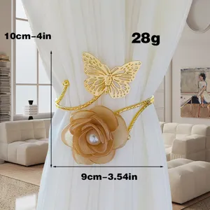 Elegante fermatenda magnetico in metallo con farfalla dorata e fiore in tessuto con perla.