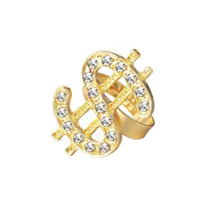 Gold dollar sign rhinestone ring hip hop fashion statement jewelry close up detail