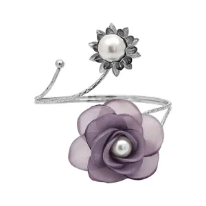 Metal curtain tieback with purple fabric flower and pearl decor, adjustable open band.