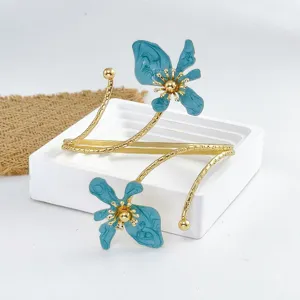 Brazalete de metal dorado con flor azul, pulsera abierta ajustable joyas de moda para mujer.