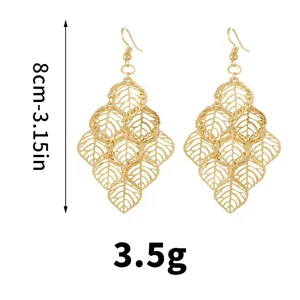 Golden hollow leaf dangle earrings for women, elegant metallic drop earrings fashion jewelry.