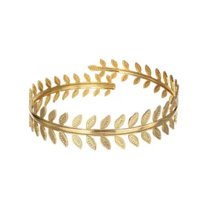 Exquisite gold leaf open cuff bracelet detail, elegant goddess laurel branch jewelry design.