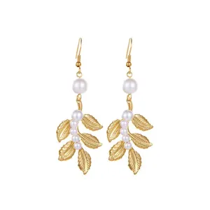 Elegant gold pearl leaf drop earrings detail, stunning dangling jewelry piece for women.