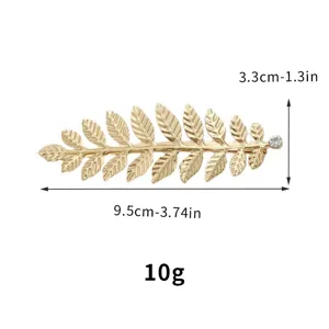 Golden leaf hair clip detail view showing product dimensions length and width clearly.