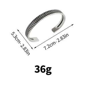 Bracelet jonc ouvert en acier inoxydable avec motif torsadé et dimensions détaillées.