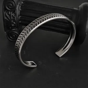 Bracelet jonc ouvert torsadé en acier inoxydable pour hommes et femmes, bijou élégant.