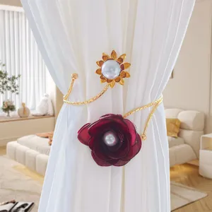 Metal curtain tieback with fabric flower and pearl decor, adjustable punch-free holdback.