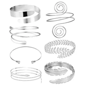 Minimalist metal arm cuff set for women, featuring geometric spiral, leaf and snake designs.