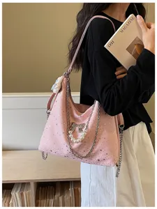 Borsa a tracolla rosa con stampa stella, catena metallica e fiocco per la moda donna.