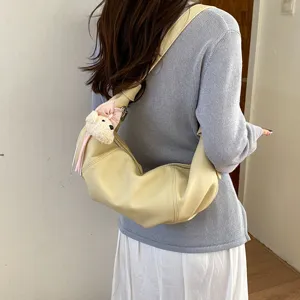 Stylish casual croissant shoulder bag for women with cute bear charm everyday commute