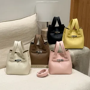 Women Litchi Pattern PU Leather Bucket Bag Versatile Handheld Shoulder Crossbody Bag With Metal Lock And Cute Bear Pendant