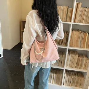 Borsa tote rosa chic da donna con catena di perle e fiocco, elegante borsa a spalla ideale.
