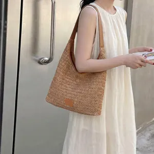 Borsa a tracolla hobo in paglia intrecciata estiva da donna, borsa mare casual con manici in pelle.